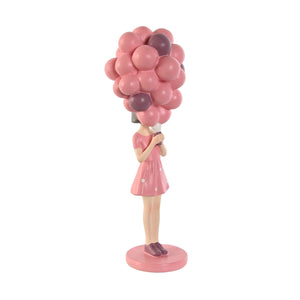 Figura niña con globos