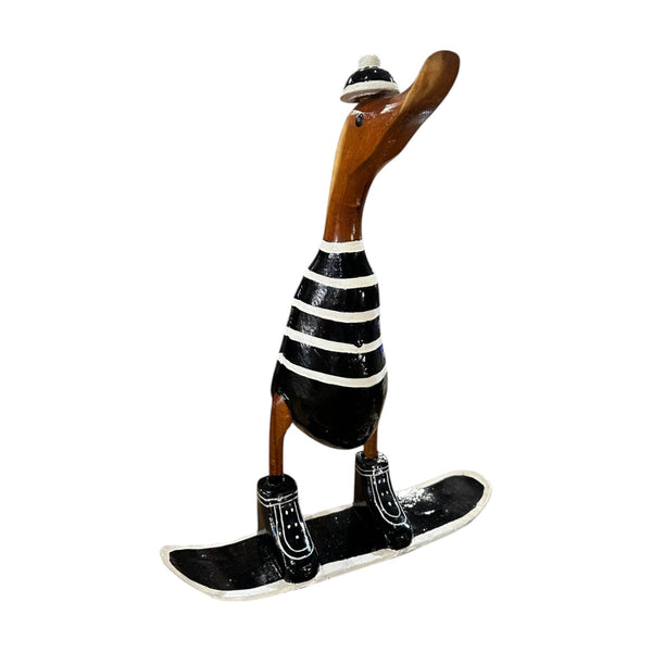 Figura pato en patinete