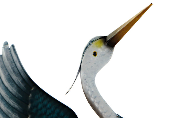 Garza blanca y azul alas abiertas